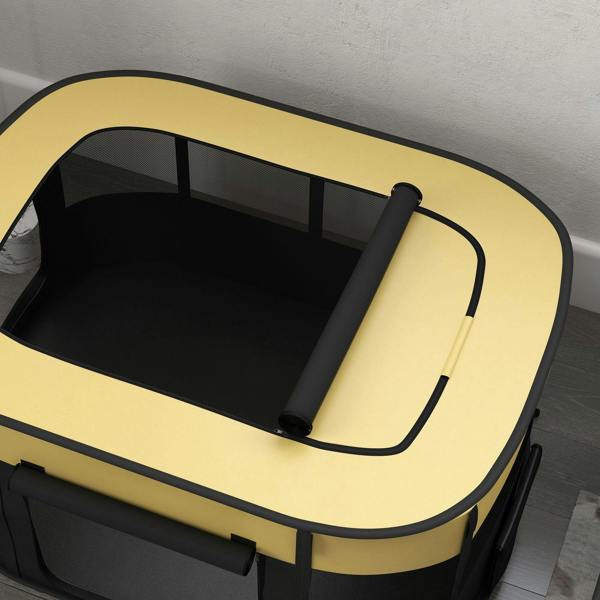 Yellow foldable dog playpen top view with black floor mat and poles