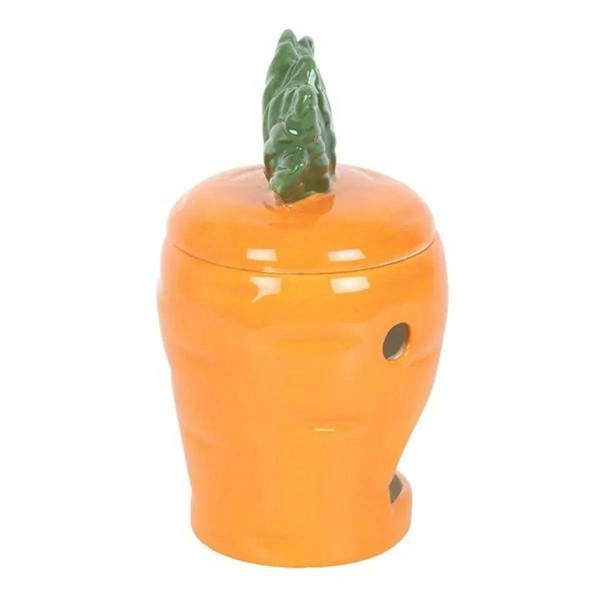 Carrot-shaped oil burner with green leaf top and orange ceramic ventilation cutouts