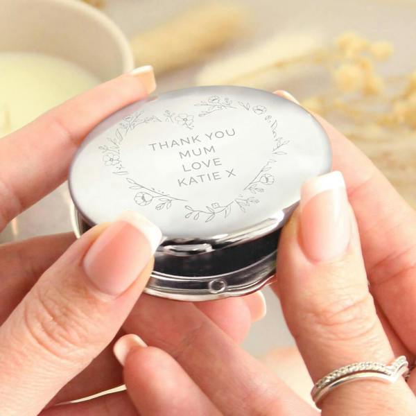 A silver nickel-plated compact mirror engraved with a floral heart reading Thank You Mum Love Katie X.