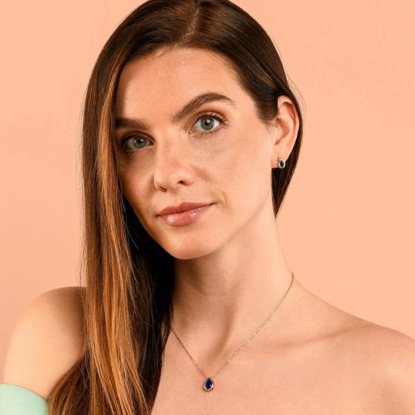 Zavana Gold Plated Blue Bezel Set Stud Earrings with Pear-Shaped Blue Cubic Zirconia Stones