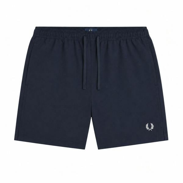 Fred Perry navy swim shorts with elastic waist, drawstring, and white laurel wreath logo.