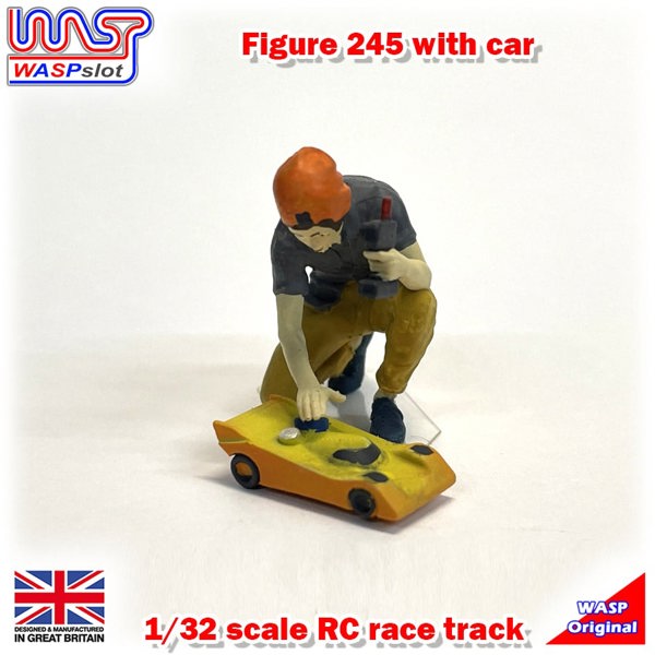 a toy figurine of a man with a toy car