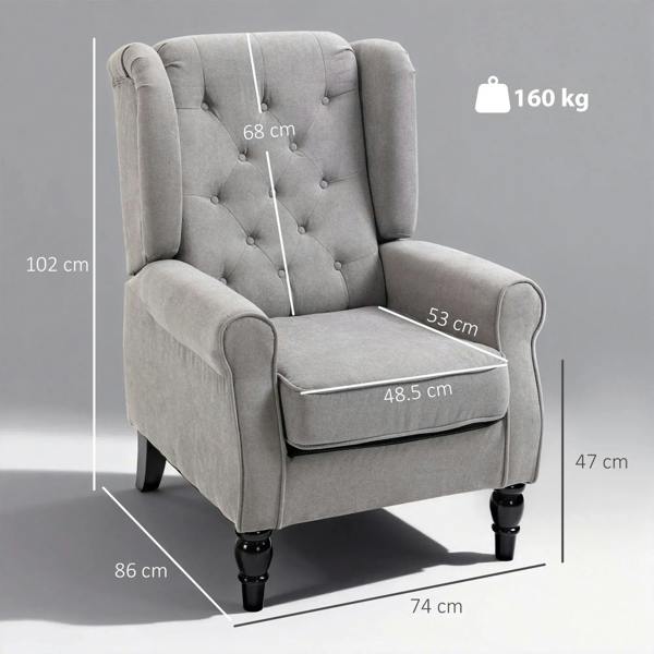 Light grey wingback armchair with button-tufted back and padded seat