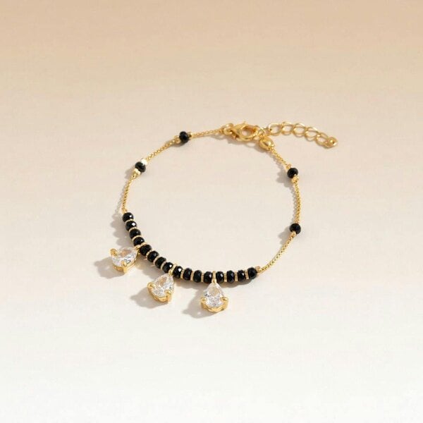 The Colourful Aura Black Bead Mangalsutra Zircon drop gold nazar Bracelet