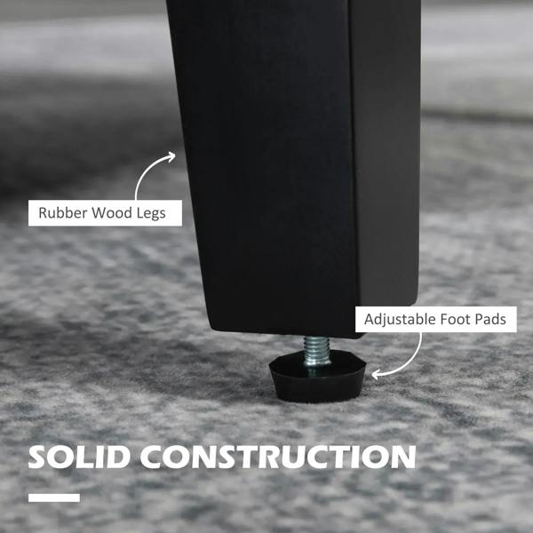 Light grey armchair with black rubber wood legs and adjustable foot pads