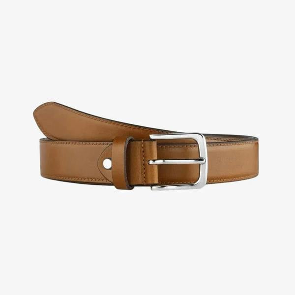 Cognac leather belt with a silver buckle on a white background