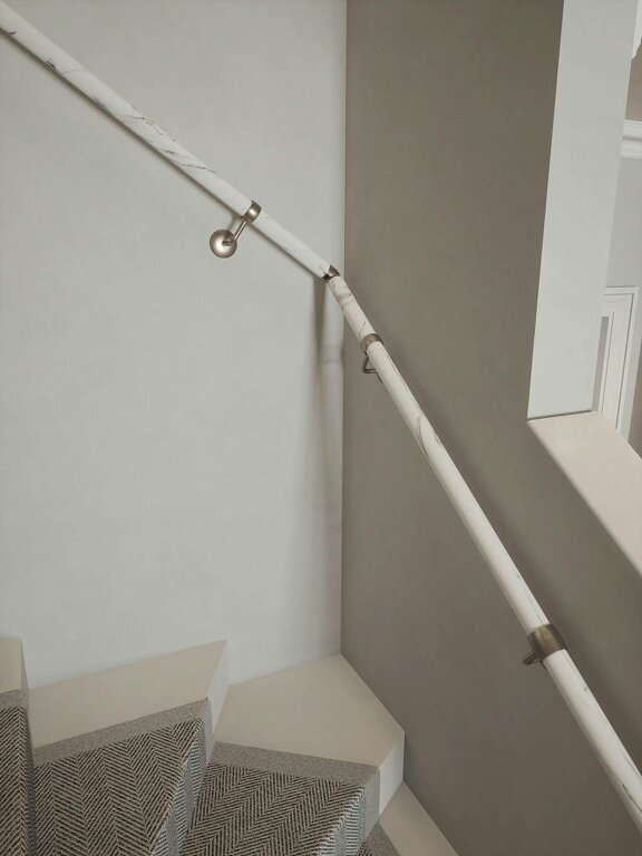 Handrails Direct Montford Soft White Marble Single Winder Handrail