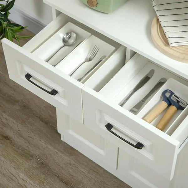 White cabinet pull-out drawer with utensil slots and dividers