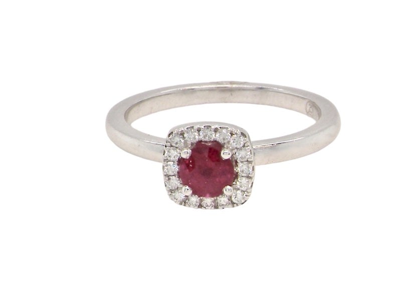 A cushion shaped ruby an d diamond  ring