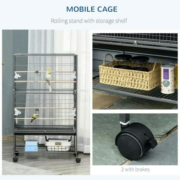Mobile dark grey bird cage on wheels with storage shelf and food containers on tray