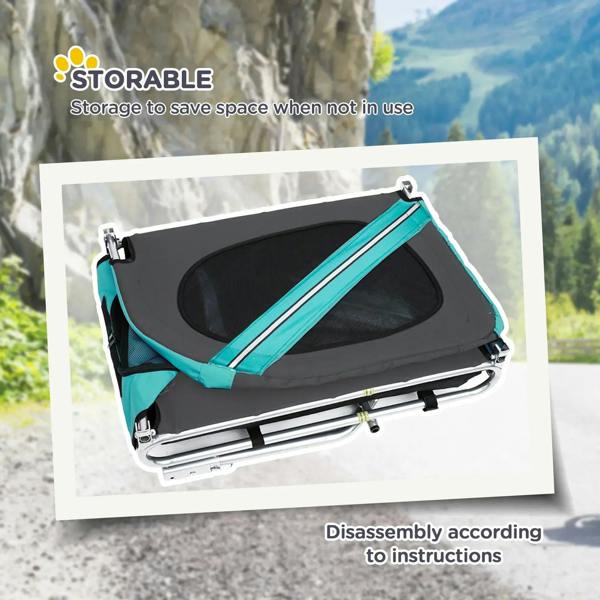 Folding bike pet trailer with black fabric cover and teal frame, shown for storage