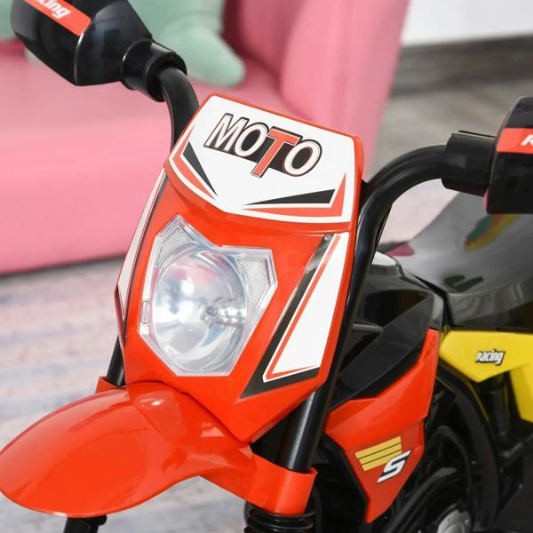 Red motorcycle-style ride-on tricycle front headlight with MOTO badge
