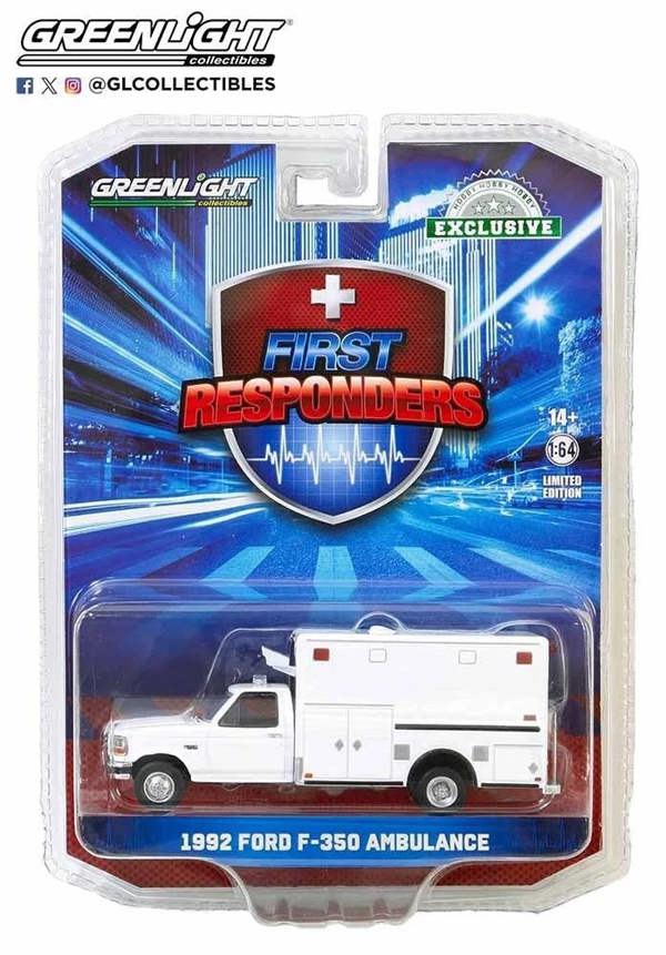 a white toy ambulance in a package