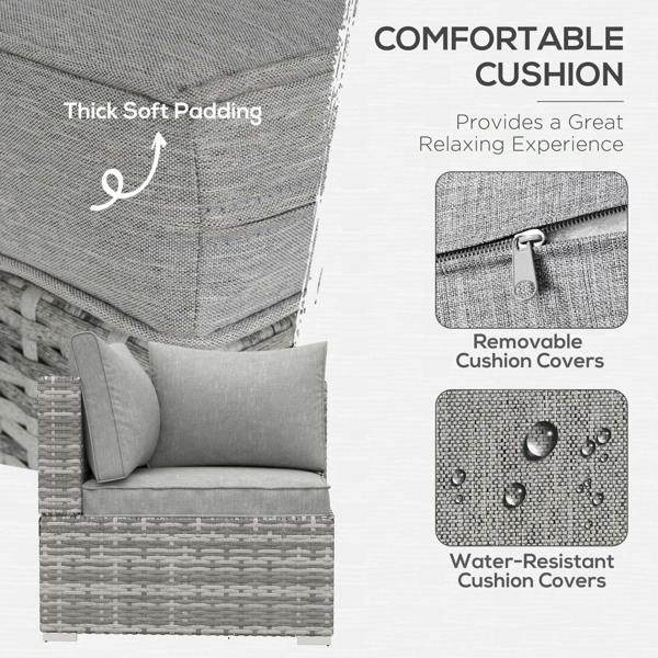 Outdoor rattan sofa chair with thick light grey cushion and removable, water-resistant covers.