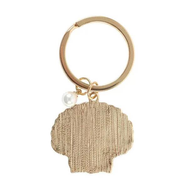 Gold-tone keyring with gold textured seashell charm and white pearl