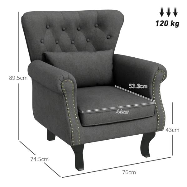 Dark grey Chesterfield-style accent chair with tufted back and studded armrests