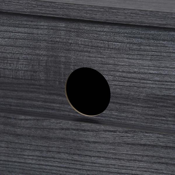 Round cable management hole on glossy black cabinet surface