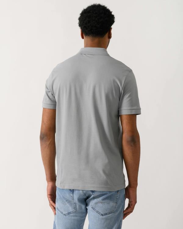back shot of a model wearing a BOSS Orange Passenger Mens Stretch-Cotton Slim-Fit Polo Shirt with Logo Patch in Silver 047