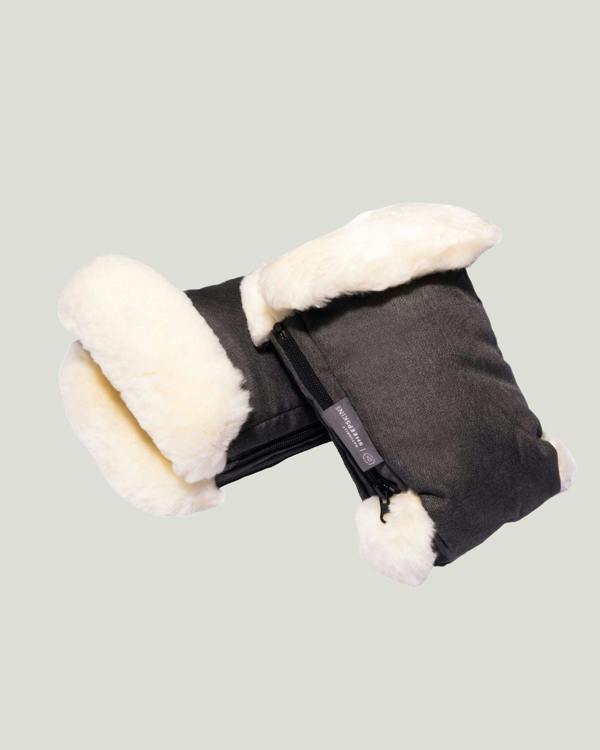 Grey sheepskin mittens stacked