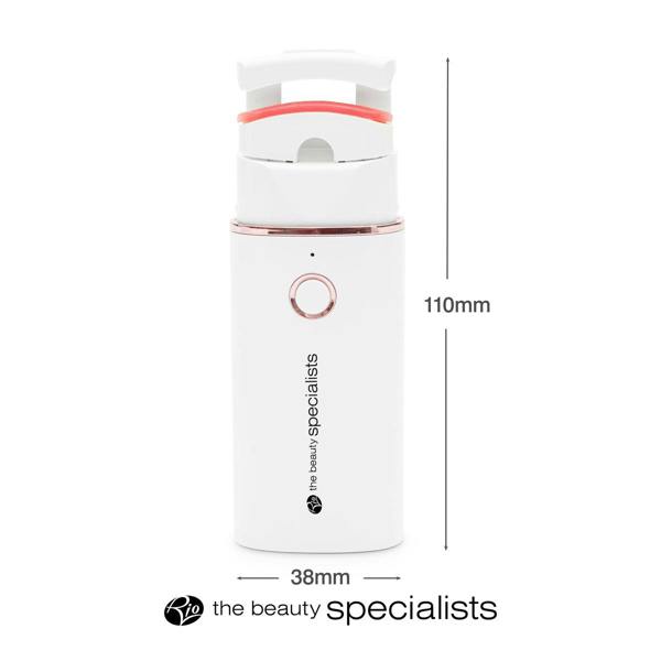 The WOW Lash Heated Eyelash Curler by Rio is a white device, 110mm tall and 38mm wide, with a circular front button and rose gold top accent—ideal for beautifully curled lashes.