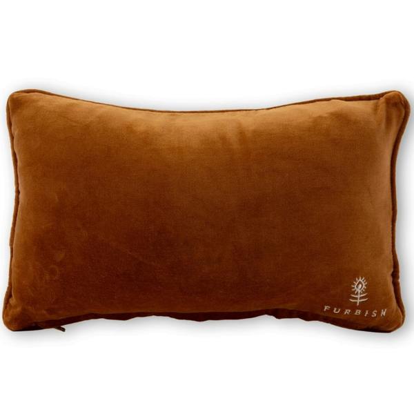 The reverse side of a rectangular needlepoint cushion, showcasing a smooth brown velvet backing with a small white embroidered Furbish Studio logo in the bottom right corner.