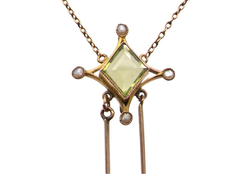 Vintage Tom An antique garnet and peridot pendant