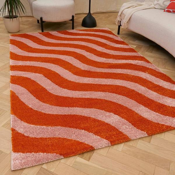 Patterned orange and pink fabric texture