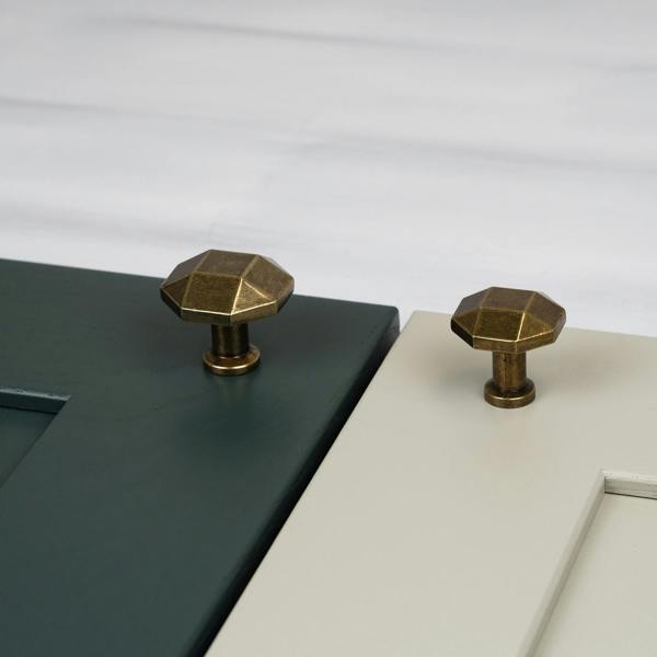 Octagonal shaped antique brass knobs