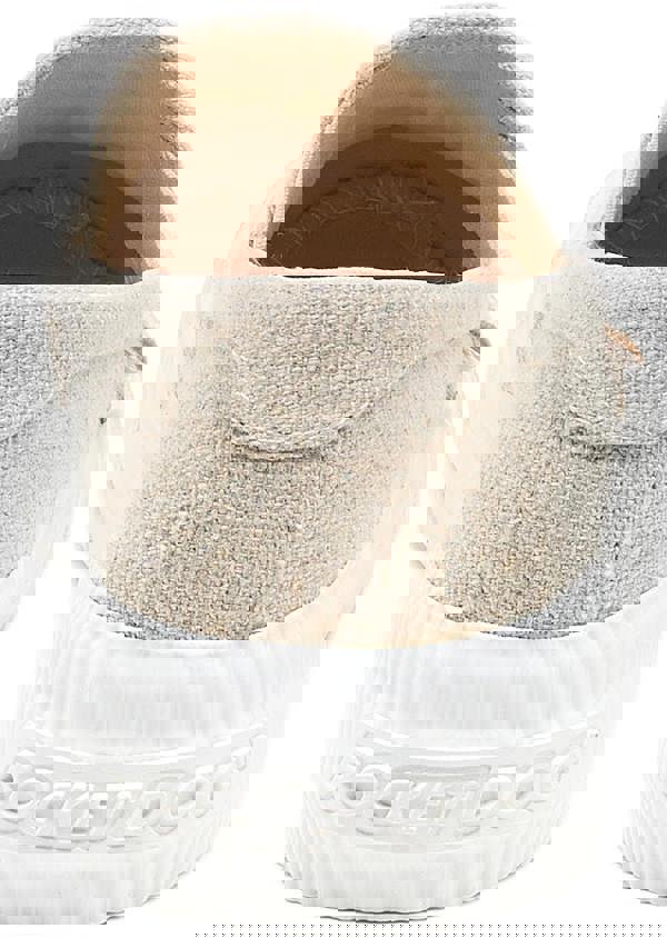 Rocket Dog Cheeryful Womens Slip On Casual Trainers Shoe, beige canvas slip-on sneaker with a white rubber sole with 'ROCKET DOG' embossed, lightweight and comfortable design.