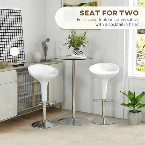 Round high bar table for two with clear glass top and polished metal base