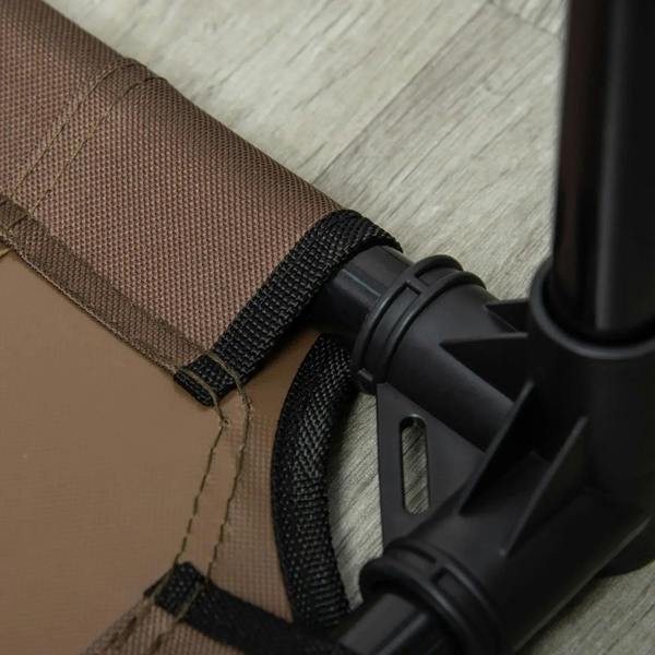 Corner strap and black leg joint detail on a brown elevated dog cot