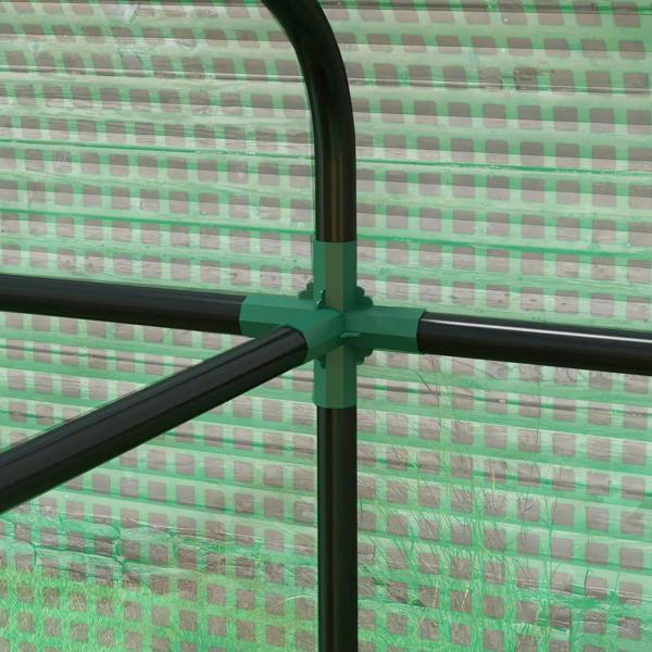 Green mesh greenhouse frame corner with black metal bars and cross connector joint