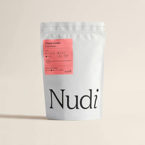 Nuditea Cherry Cooler: A refreshing fruit-based cold infusion and iced tea blend in plastic free whole leaf teabags.