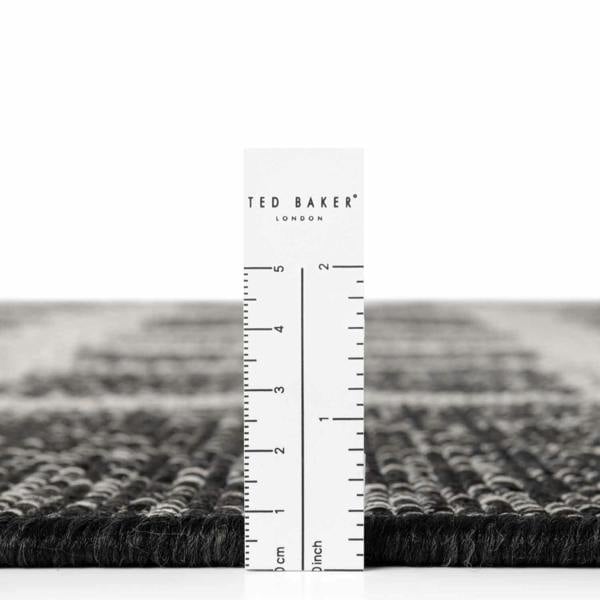 Rug with a ruler for scale, featuring the Ted Baker London brand.
