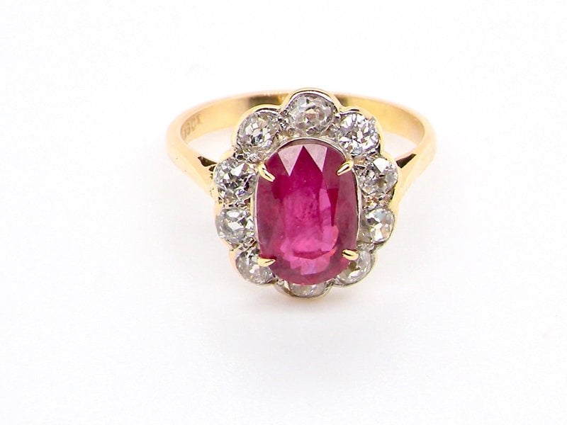 Vintage Tom A fine ruby and diamond cluster ring