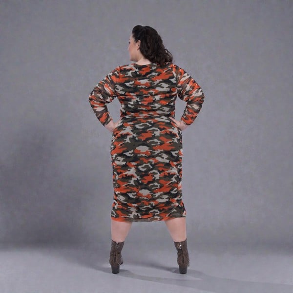 Women's Plus Size Orange Green Grey Camouflage Bodycon Midi Dress styled with green boots for a modern, stylish look.