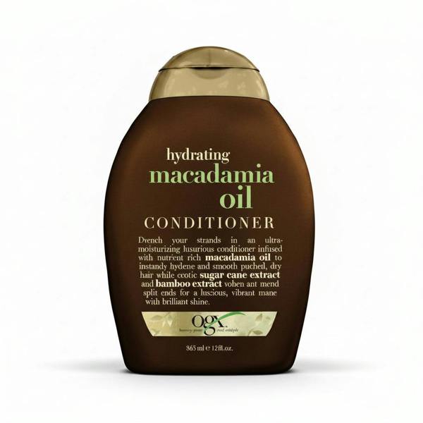 OGX hydrating macadamia oil conditioner bottle on a white background