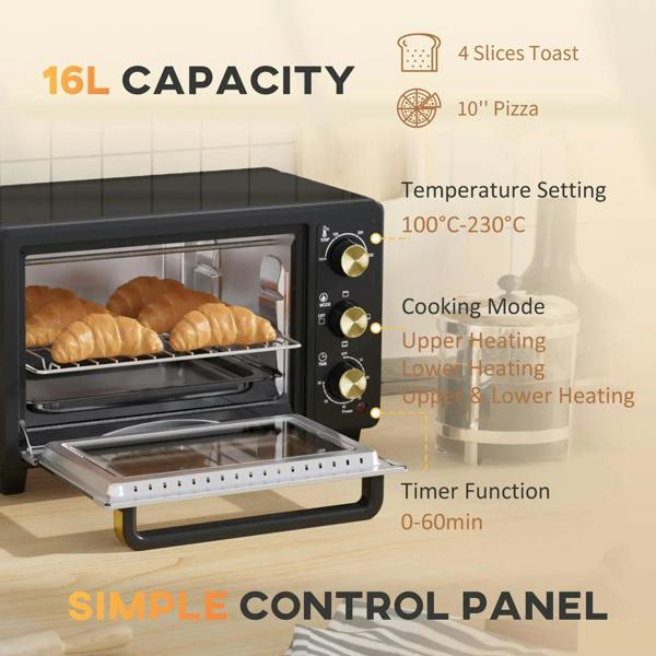Black countertop oven with open door and gold control panel knobs