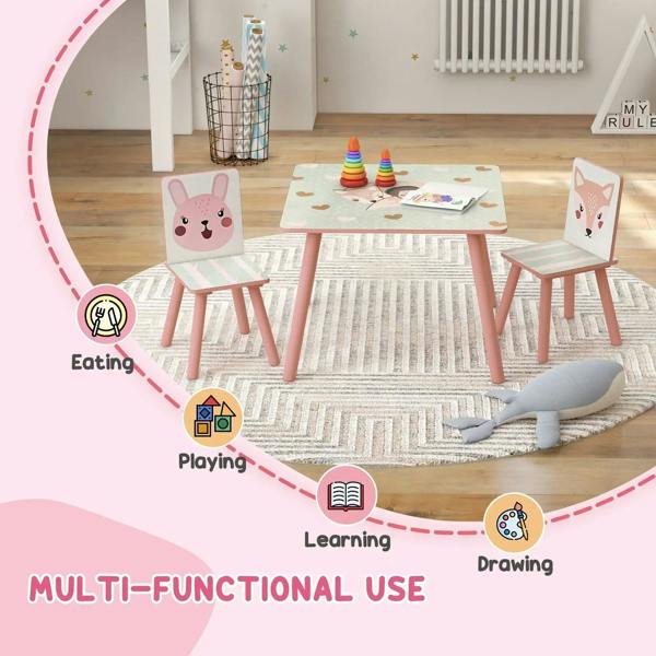 Pink kids table with two matching chairs, animal face panels, and patterned surface