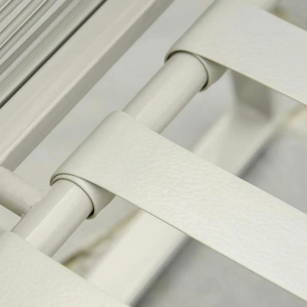 Close-up of grey rattan arms and seat supports on the outdoor sofa
