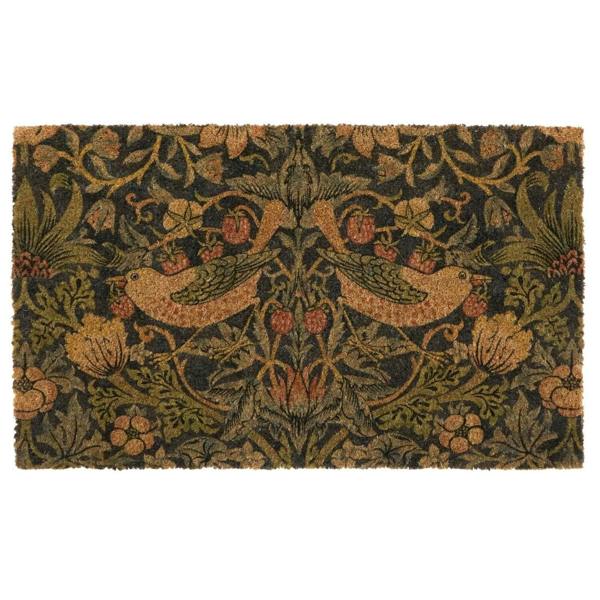 Decorative doormat with bird and floral pattern on a white background
