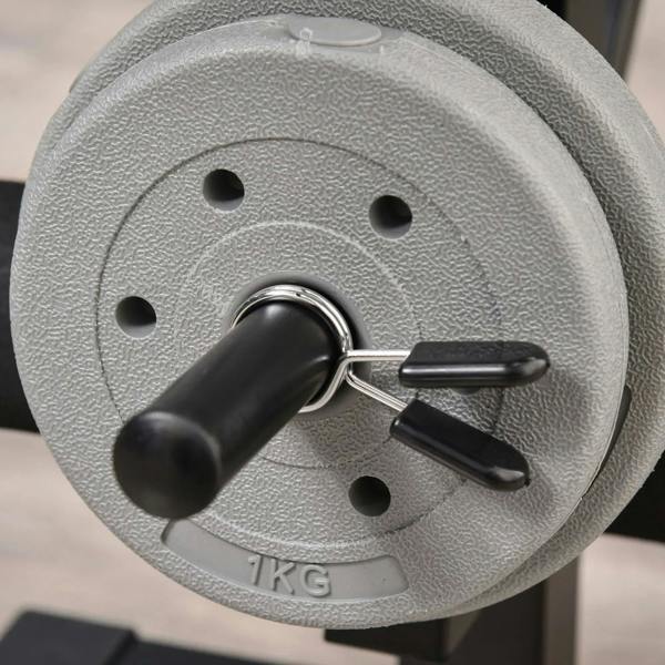 Textured weight plate with knurled handle grip, labeled 1KG