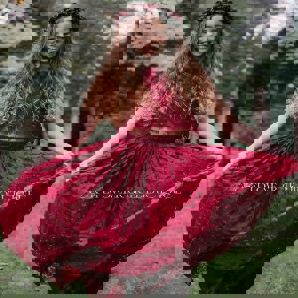 Girl dancing in red dress