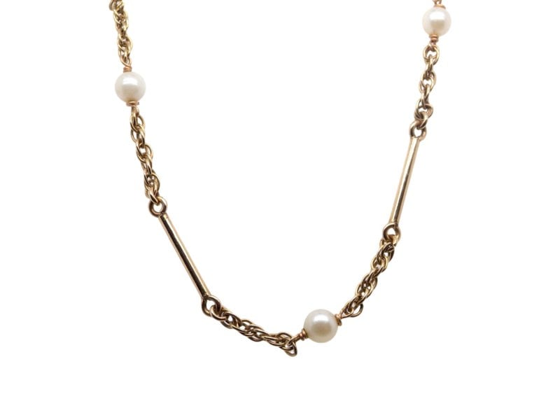 A pearl and gold necklace