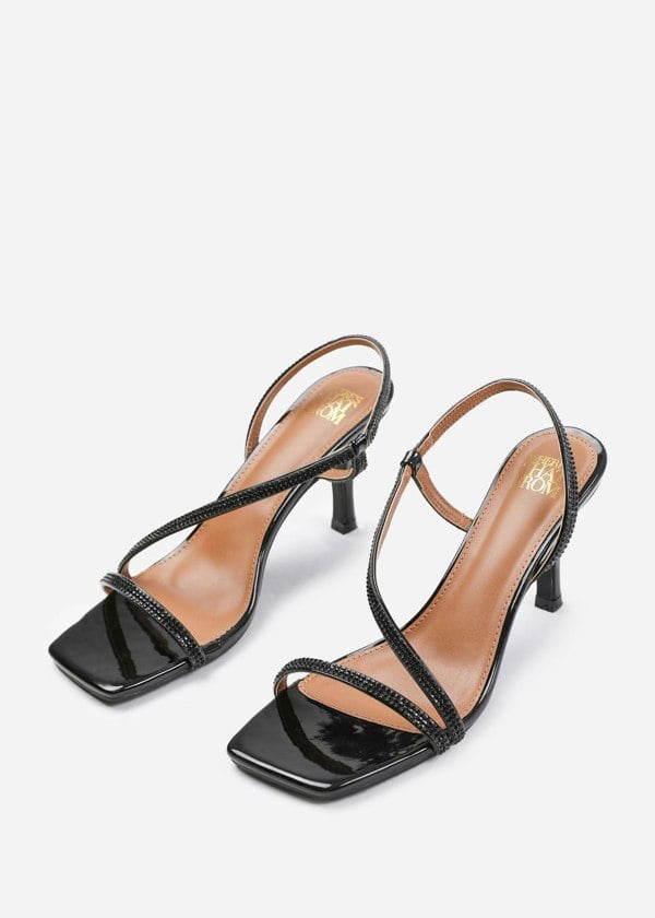 Where's That From Ivy Crystal Cross Foot Strap Mid Heels in Black Patent