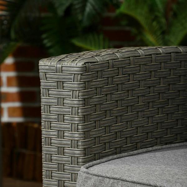 Grey woven rattan armrest detail with corner texture and padded cushion edge