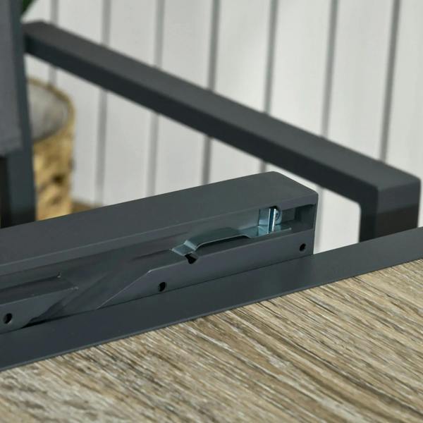 Extending mechanism detail on dark aluminium frame outdoor dining table