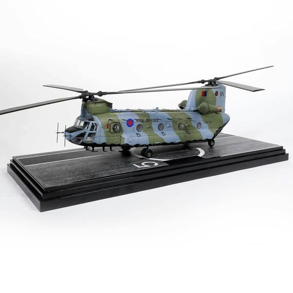 a model of a helicopter on a runway