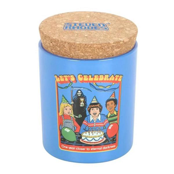 Blue “Let’s Celebrate” candle jar with cork lid, top label visible