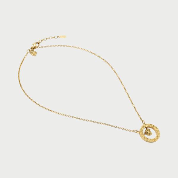 Supplied Fashion gold Medusa head pendant necklace with a circular Greek key border on a delicate chain